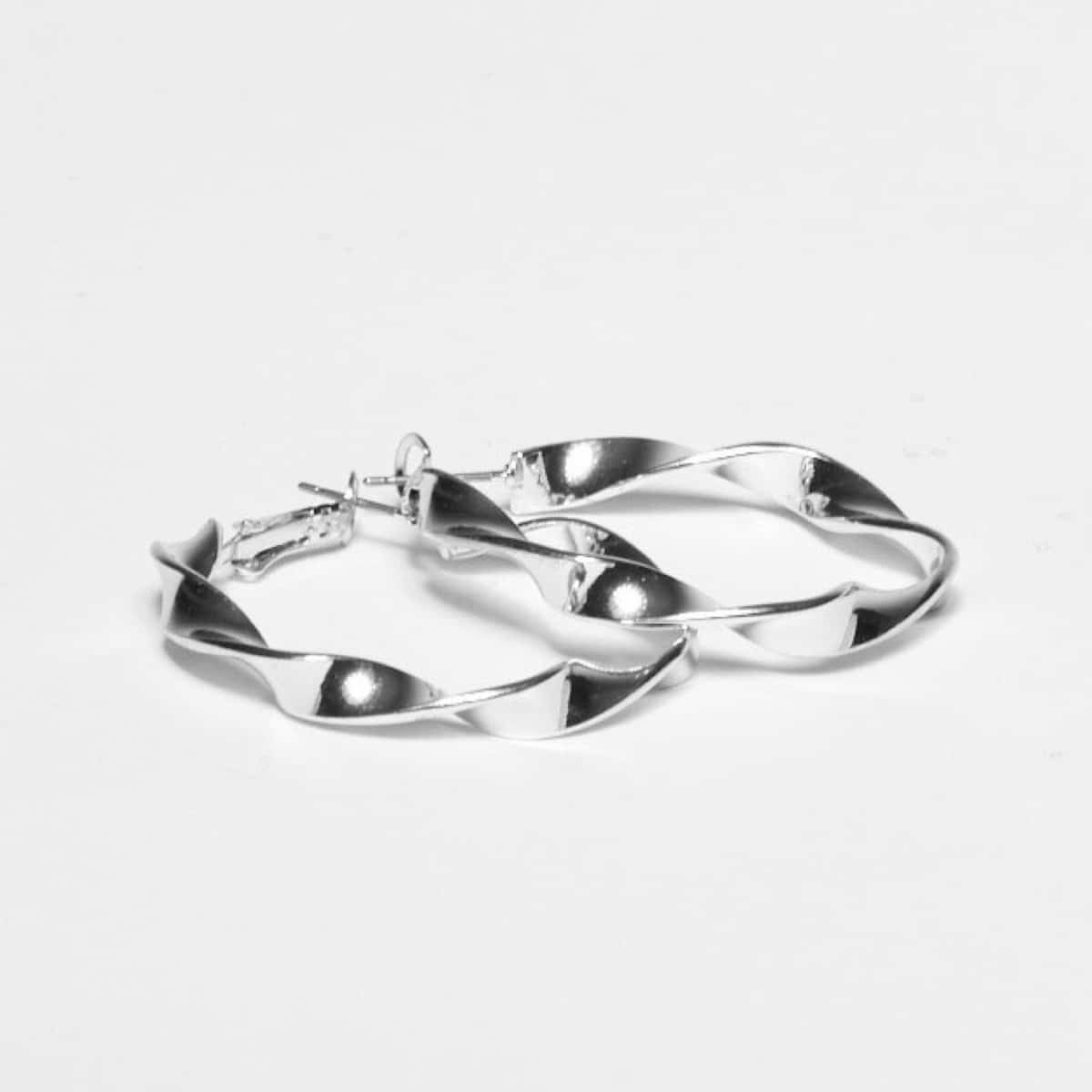 Omslagsbild för “Örhängen Julia ring silver”